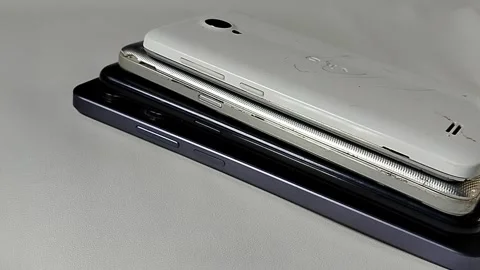 Central Java Indonesia 23 March 2026: Multiple smartphones stacked together. Stock-Footage 332067050