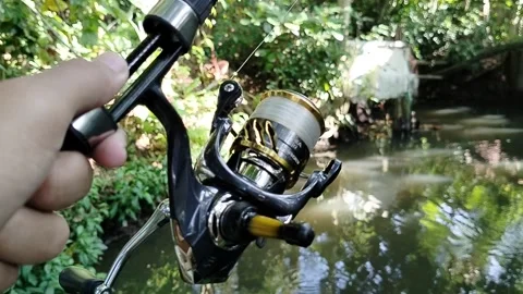 Central Java, Indonesia, 23 March 2026: High-quality fishing rod and spinning re Stock Footage 334326024