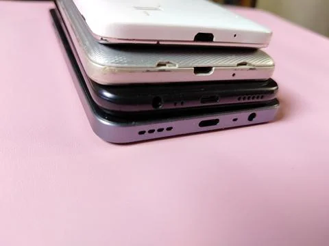 Central Java Indonesia 23 March 2026: Multiple smartphones stacked Stock-Fotos