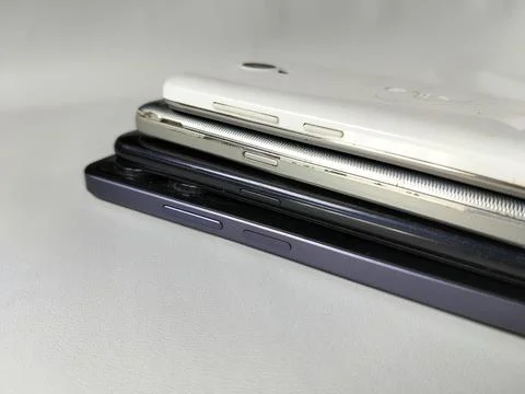 Central Java Indonesia 23 March 2026: Multiple smartphones stacked Stockfoto's