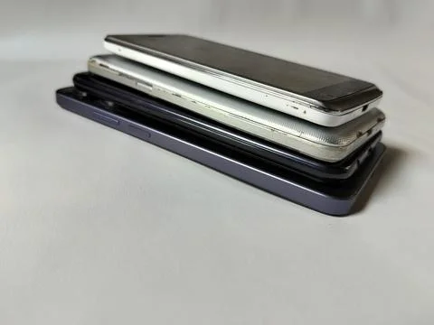 Central Java Indonesia 23 March 2026: Multiple smartphones stacked Stockfoto's
