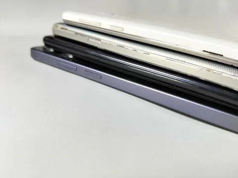 Central Java Indonesia 23 March 2026: Multiple smartphones stacked 写真素材