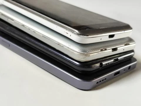 Central Java Indonesia 23 March 2026: Multiple smartphones stacked Stock-Fotos
