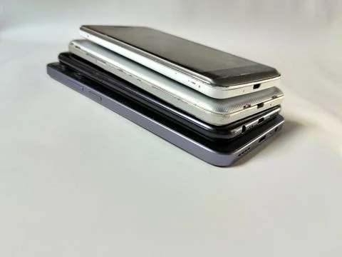 Central Java Indonesia 23 March 2026: Multiple smartphones stacked Stockfoto's