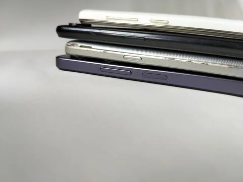 Central Java Indonesia 23 March 2026: Multiple smartphones stacked Stockfoto's