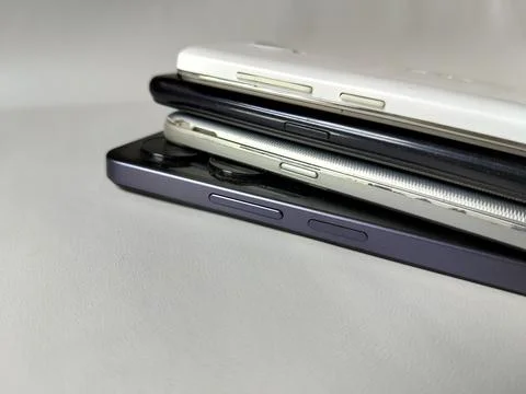 Central Java Indonesia 23 March 2026: Multiple smartphones stacked Stockfoto's