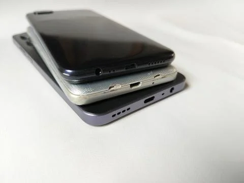 Central Java Indonesia 23 March 2026: Multiple smartphones stacked Stockfoto's