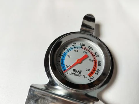 Central Java Indonesia 23 March 2026: Stainless steel oven thermometer showing  스톡 사진
