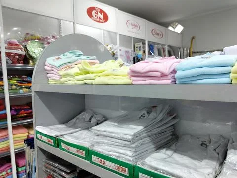 Central Java Indonesia 24 August 2026: Stacks of neatly folded pastel baby cloth 库存照片