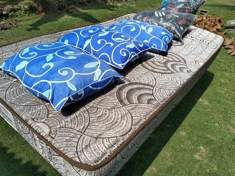 Central Java Indonesia 24 June 2026: Fresh mattress and pillows sun-drying  Stock-Fotos