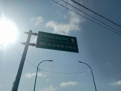 Central Java Indonesia 26 June 2024: road signs, sun backlight background. Foto stock