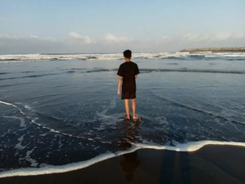 Central Java, Indonesia 26 May 2024: Young people in black t-shirts, on holiday Фото