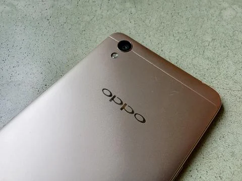 Central Java Indonesia 27 October 2024: Rear Oppo brand smartphone. Photos