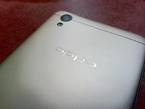Central Java Indonesia 27 October 2024: Rear Oppo brand smartphone. Photos