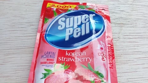 Central Java, Indonesia 27 Sept 2024: Superpell Korean Strawberry Floor Cleaner. Stock Footage 287371152