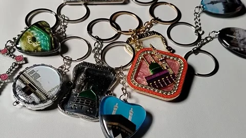 Central Java Indonesia 28 June 2026: Hajj and Umrah souvenir keychain isolated  Stock Footage 337826029