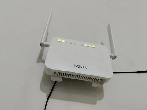 Central Java Indonesia 28 March 2026: Nokia WiFi router mounted on wall, active  Stock-Fotos