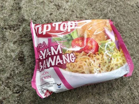 Central Java Indonesia 28 March 2026: Packaged instant noodle product Tip Top ch Фото