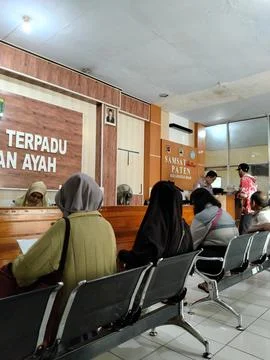 Central Java, Indonesia, 29 April 2026: Visitors sit in the waiting area while  Fotos Stock