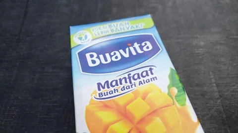 Central Java Indonesia, 29 October 2024: Buavita, a mango flavored fruit juice  Stock Footage 289741289
