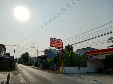 Central Java Indonesia 29 October 2023: Alfamart mini market signpost text. Фото