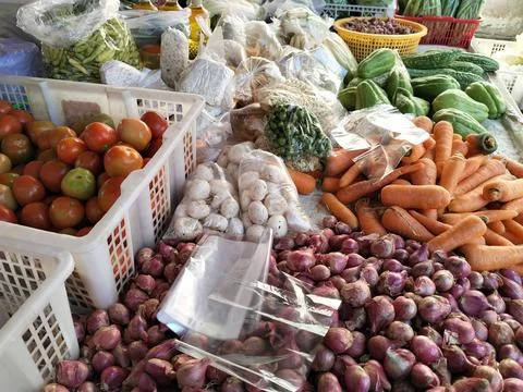Central Java Indonesia 3 July 2026: Colorful vegetable vendor booth at a local  Stock Photos