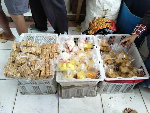 Central Java Indonesia 3 July 2026: Fresh tofu displayed in plastic baskets  Stock Photos