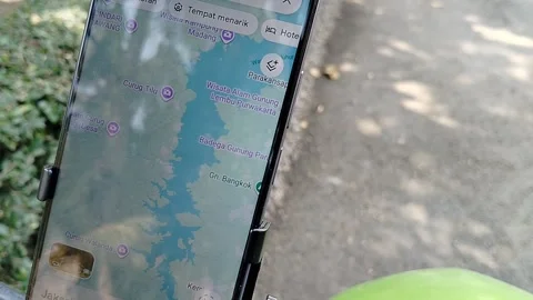 Central Java Indonesia 30 July 2026: Detailed close-up of a smartphone attached  Stock Footage 340898277