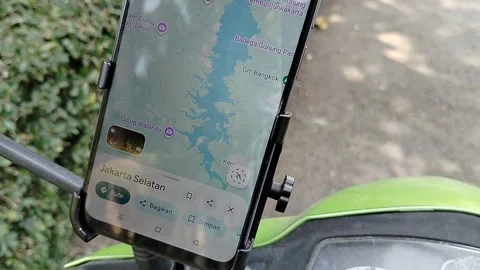 Central Java Indonesia 30 July 2026: Detailed close-up of a smartphone attached  Stock Footage 340898281