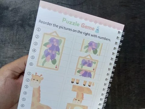 Central Java, Indonesia 30 July 2024: puzzle game on one page, book for preschoo Фото