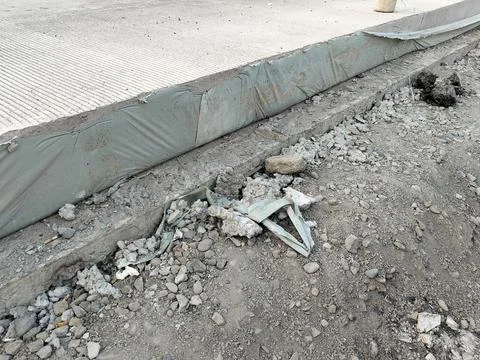 Central Java Indonesia 4 July 2026: Newly completed concrete road with roadside  库存照片