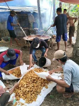 Central Java Indonesia 4 June 2026: Villagers work together to make traditional Stock Photos