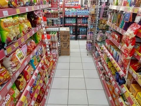 Central Java Indonesia 4 May 2024: Alfamart minimarket shelves Фото