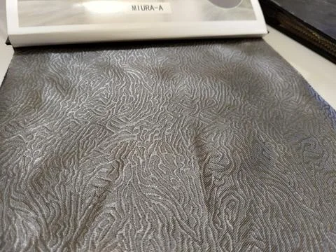 Central Java Indonesia 5 August 2026: A catalog showing a gray decorative fabric Stock-Fotos