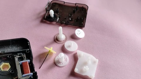 Central Java Indonesia 5 March 2026: Internal components of a quartz wall clock  Stock Footage 330771293