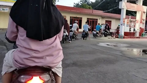 Central Java Indonesia 6 March 2026: Busy morning at a Pertamina fuel station Stock-Footage 330771285
