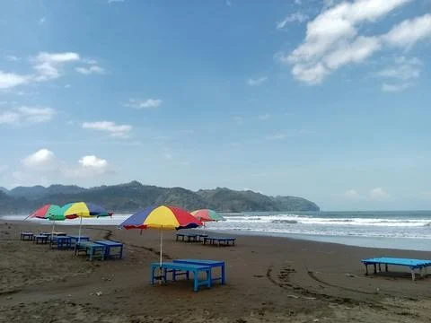 Central Java Indonesia 7 July 2024: Vibes at jetis beach Cilacap. tourism theme Stock Photos