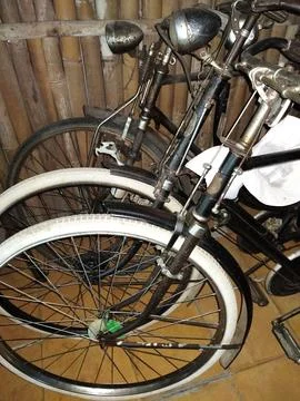 Central Java Indonesia 7 June 2026: Classic old bicycle with a rustic bamboo  Stock Photos
