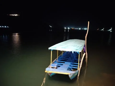 Central Java Indonesia 7 September 2026: Empty traditional wooden boat moored  Stock Photos