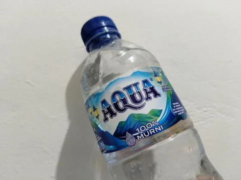 Central Java Indonesia 8 July 2026: Editorial image featuring an AQUA water Stock-Fotos