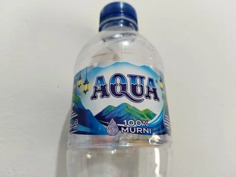 Central Java Indonesia 8 July 2026: Editorial image featuring an AQUA water Stock-Fotos