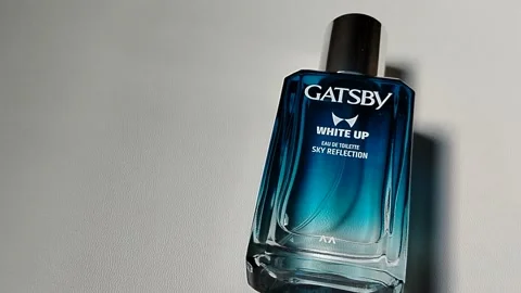 Central Java Indonesia 8 June 2026: close-up Gatsby White Up fragrance bottle Stock Footage 336975243