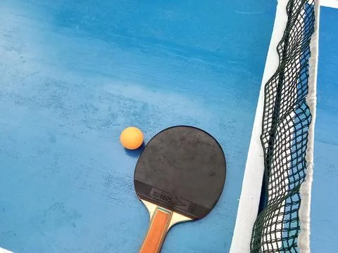 Central Java Indonesia April 12, 2023: ping pong ball and racket ping pong, on t Фото