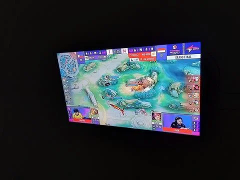 Central Java Indonesia April 13, 2025: Watching live streaming on TV, e-sports  Photos