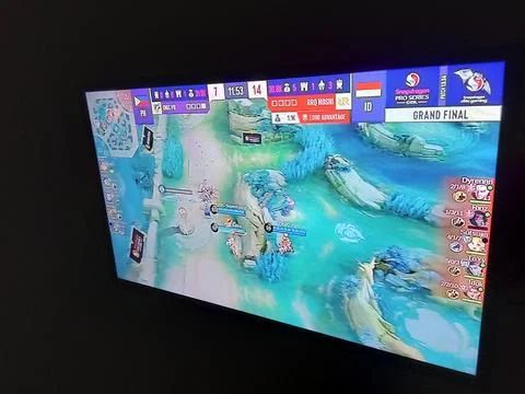 Central Java Indonesia April 13, 2025: Watching live streaming on TV, e-sports  Photos