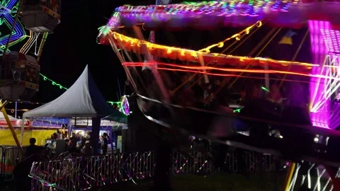 Central Java, Indonesia. April 15,2024: attractions on rotating rides Stock Footage 274828821