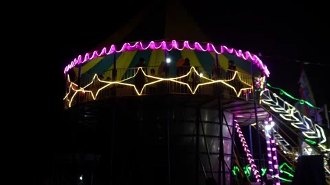 Central Java, Indonesia. April 15,2024: Closeup of colorful night market lights Stock Footage 274829872