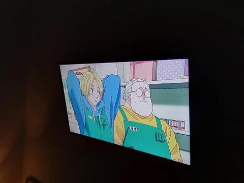 Central Java Indonesia April 27, 2025: watching on tv anime Sakamoto days. Stock-Fotos