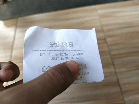 Central Java Indonesia April 29 2026: Close-up of a queue number ticket held by  Fotos Stock