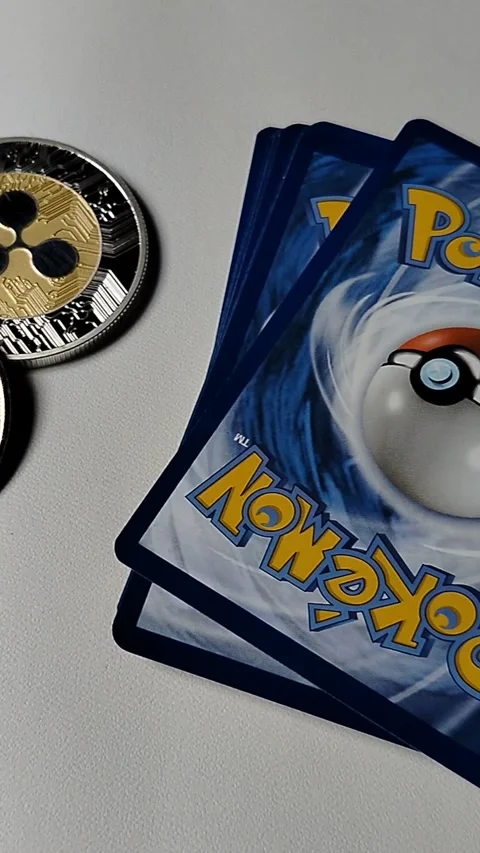 Central Java Indonesia April 30, 2026: Pokemon TCG collectible cards combined wi Stock Footage 334043589
